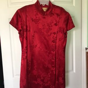 Red button down top with flower designs